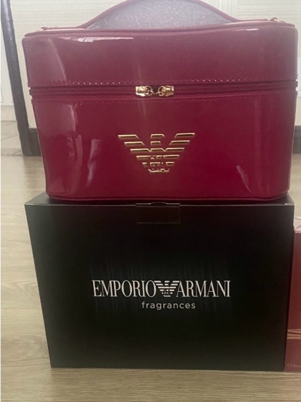 Emporio Armani Glossy Burgundy Patent Makeup Case with Gold Logo